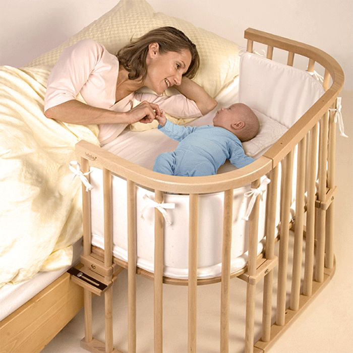 infant bed attached to parents bed